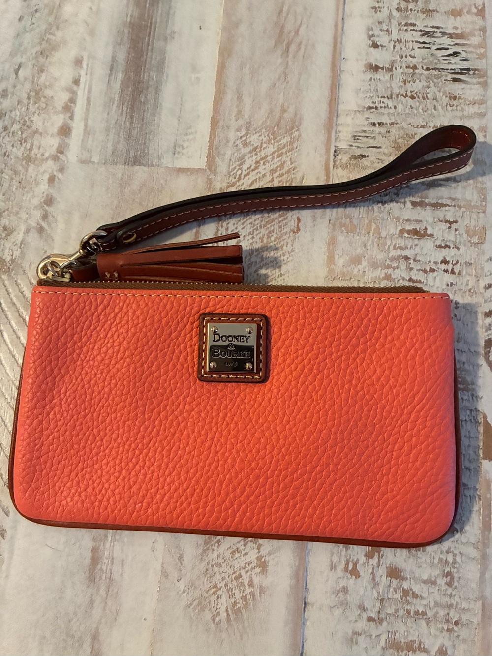 Dooney & Bourke Coral Pebbled Leather Wristlet with Brown Strap